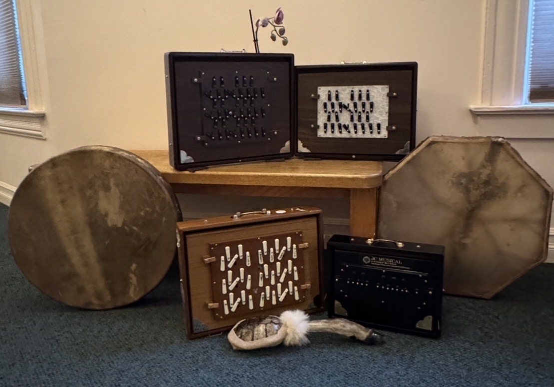 Frame drums, shruti boxes, and other sound instruments arranged together